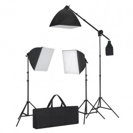 Photo studio set with softbox lights, backgrounds and a reflector